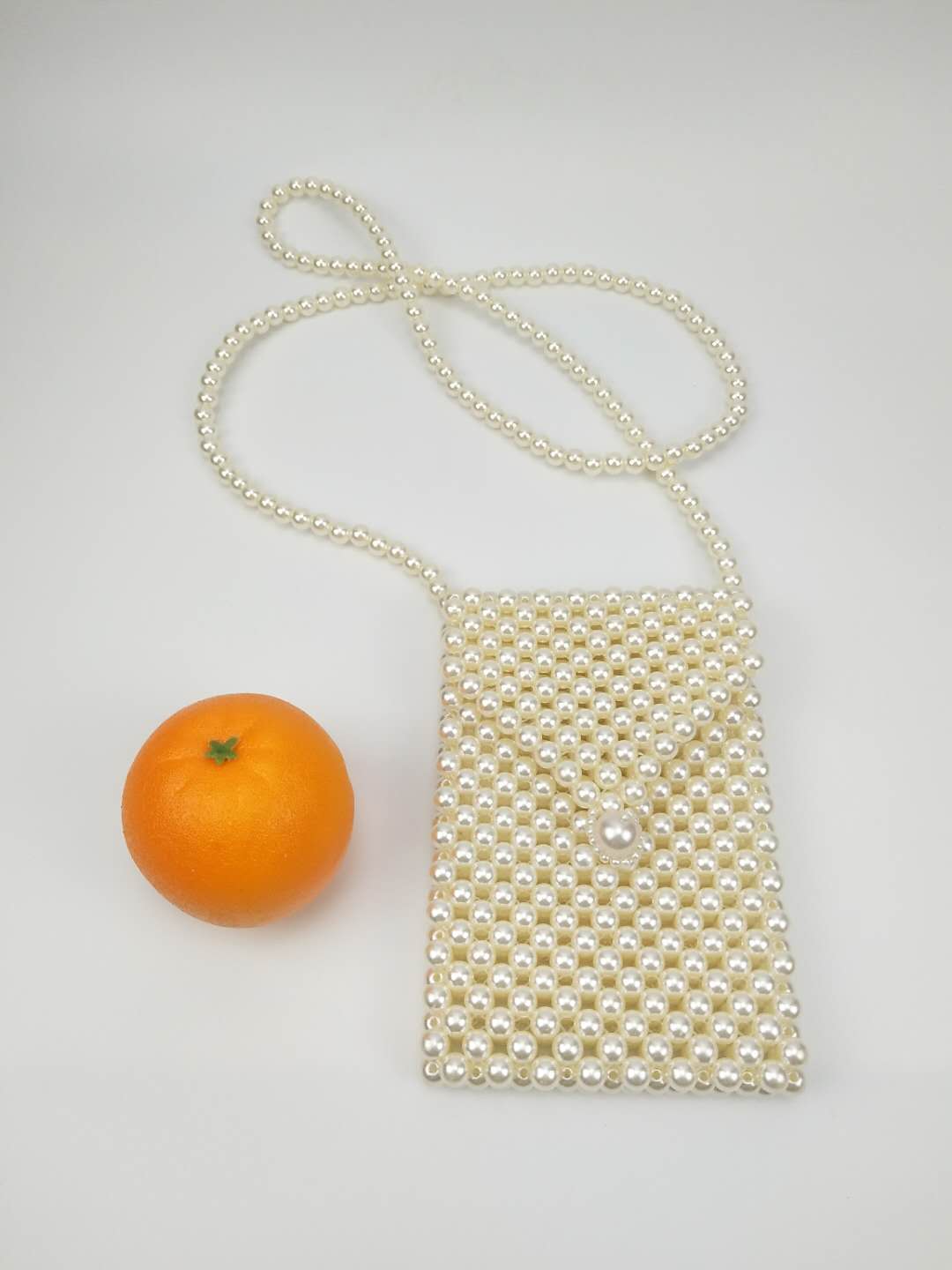 pearl woven bag