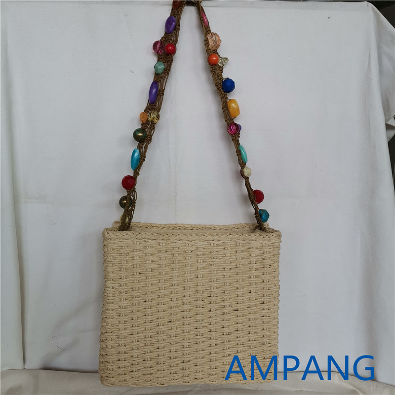 paper bag with beaded long handle